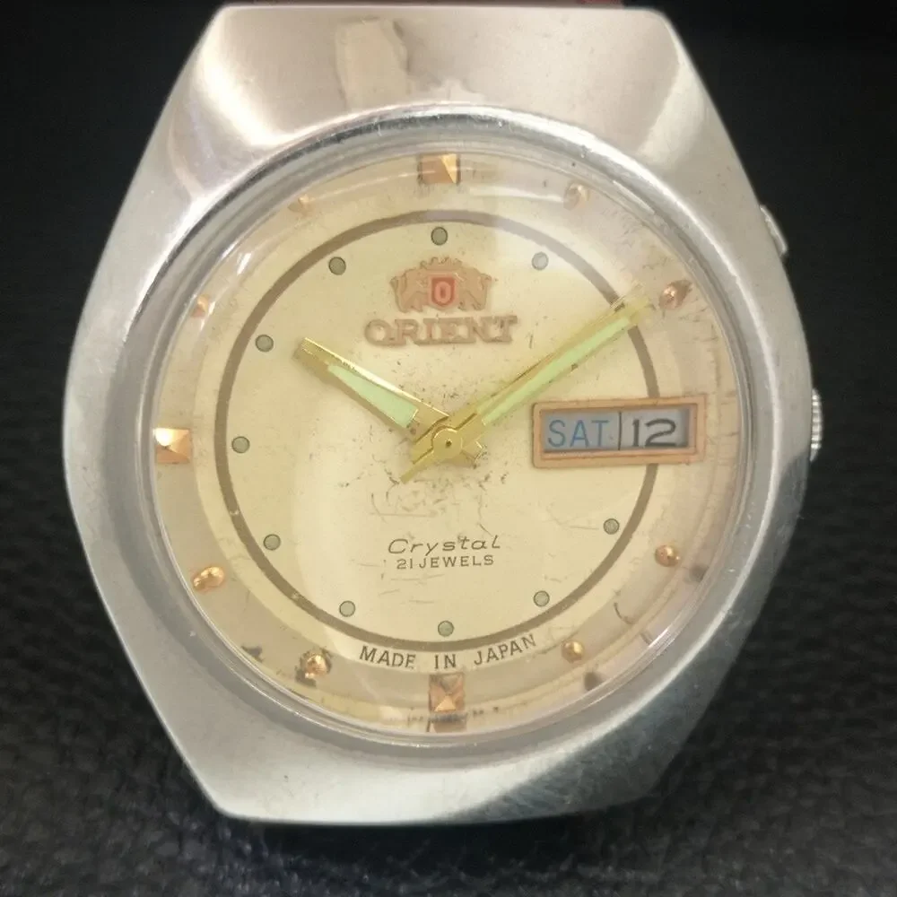 Vintage 1979 Orient Automatic Mens Silver Watch W/daydate & Gold accents